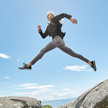 woman wearing new grey sculptek denim jumping