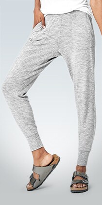 woman wearing light gray restore pants