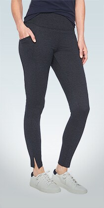 woman wearing black street rights with pinstripe on the sides