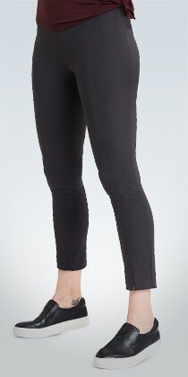 woman wearing black trek tech pants