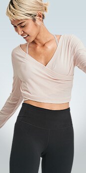woman wearing a wrap long sleeve crop long sleeve