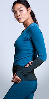 woman wearing a long sleeve cobalt blue flurry cold training top
