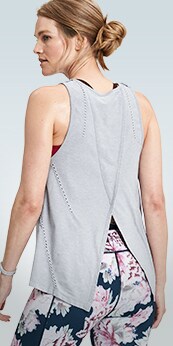 woman wearing black street rights with pinstripe on the sides