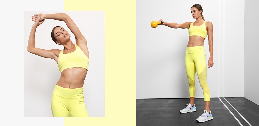 woman wearing yellow tights and sports bra