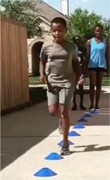 children exercising and running over obstacles