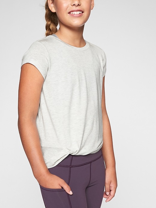 View large product image 1 of 1. Athleta Girl Hip Knot&#45ic Tee