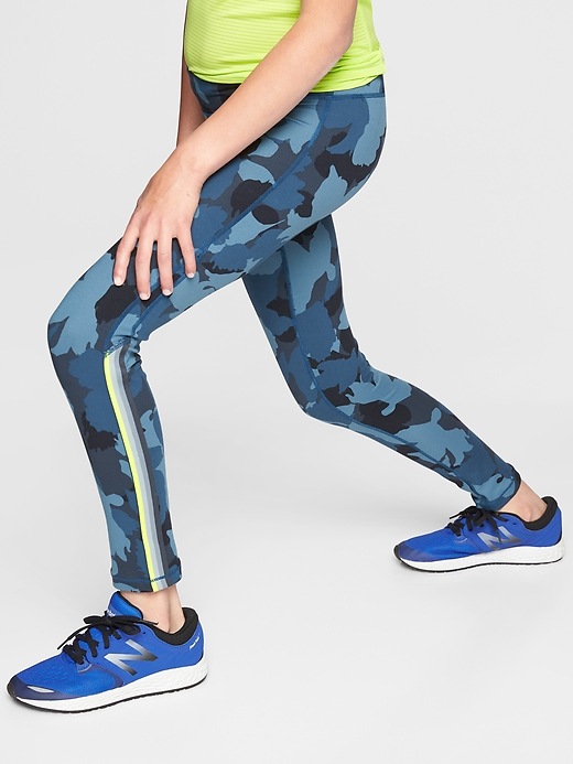 View large product image 1 of 2. Athleta Girl Chit Chat Camo Tight