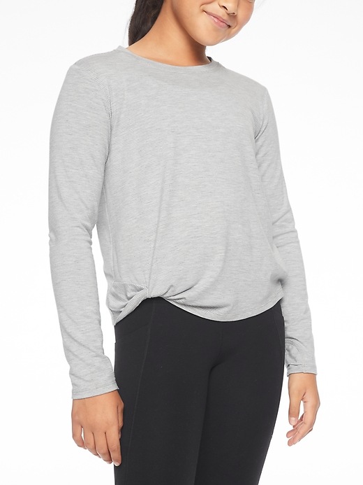 View large product image 1 of 1. Athleta Girl Hip Knot&#45ic Top