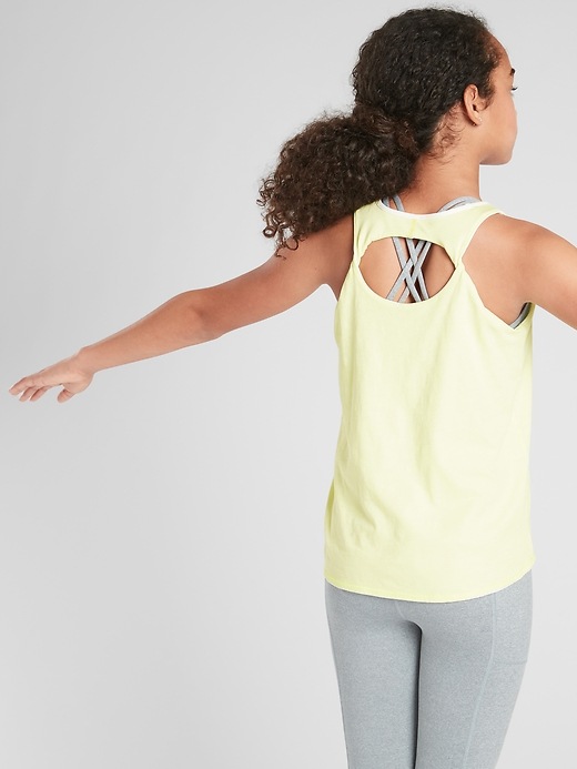 1 of 8 showing, with the color Alluring Yellow of product Athleta Girl Reversible Twistful Thinking Tank