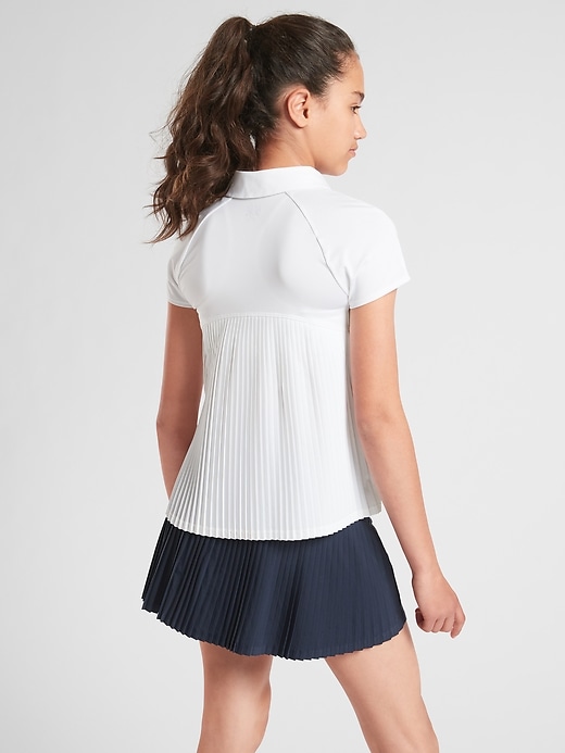 View large product image 2 of 2. Athleta Girl Pleated Polo