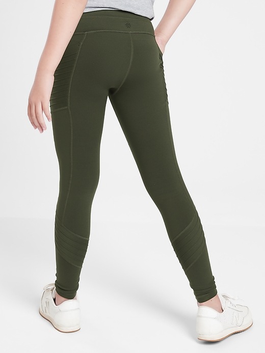 2 of 8 showing, with the color Black Olive of product Athleta Girl Moto-vation Tight