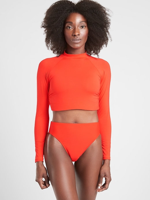 1 of 8 showing, with the color Vermillion of product North Point Crop Rashguard