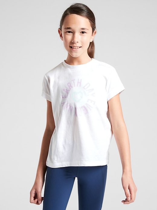 1 of 8 showing, with the color White of product Athleta Girl Earth Day Everday Tee
