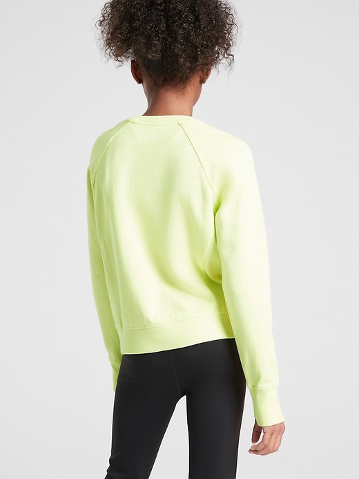 2 of 8 showing, with the color Alluring Yellow of product Athleta Girl Beachy Days Sweatshirt