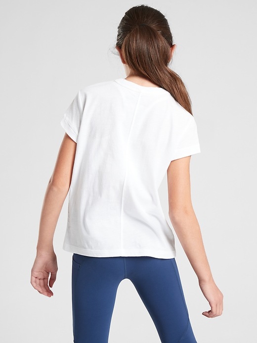 2 of 8 showing, with the color White of product Athleta Girl Earth Day Everday Tee