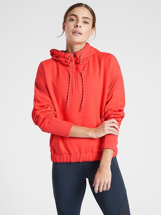 1 of 8 showing, with the color Passionfruit Coral of product Ascend Warm Up Hoodie