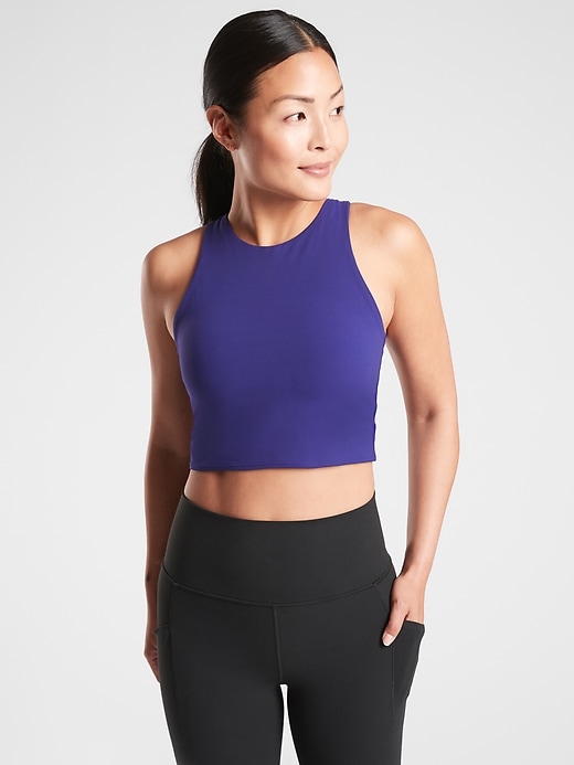 1 of 8 showing, with the color Poseidon Blue of product Conscious Crop Bra A-C