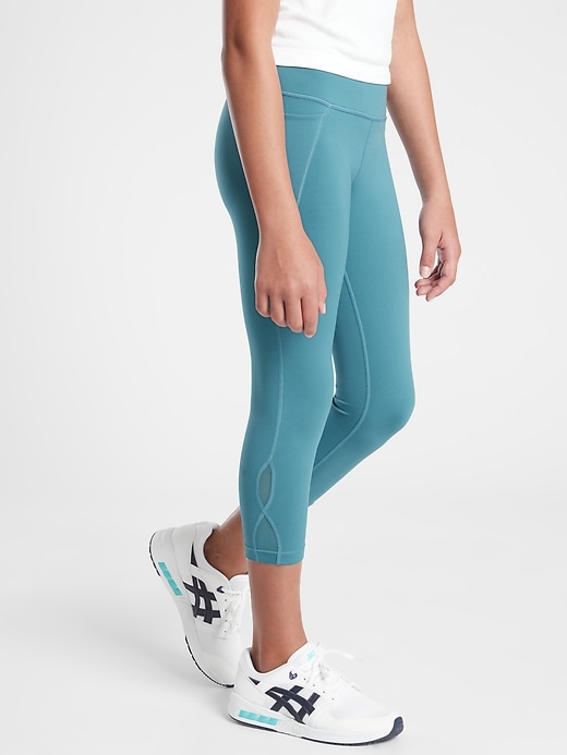 1 of 8 showing, with the color Dark Surf Teal of product Athleta Girl Truth Be Fold Powervita Capri