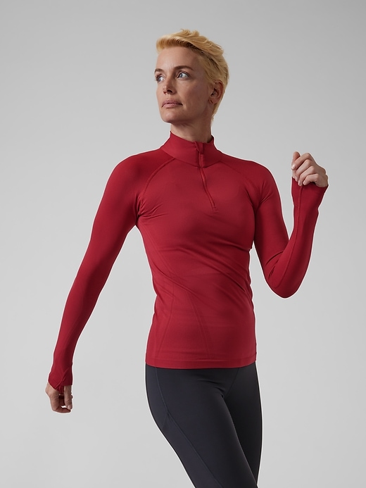 1 of 8 showing, with the color Decadent Red of product Momentum Seamless Half Zip