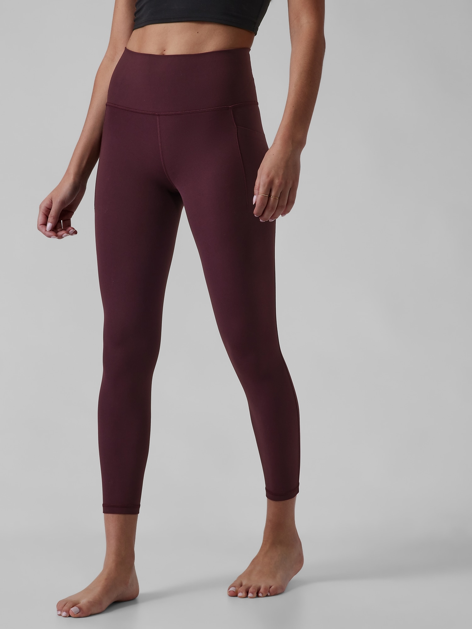 Athleta Salutation Stash High Rise 7/8 Legging purple. 1