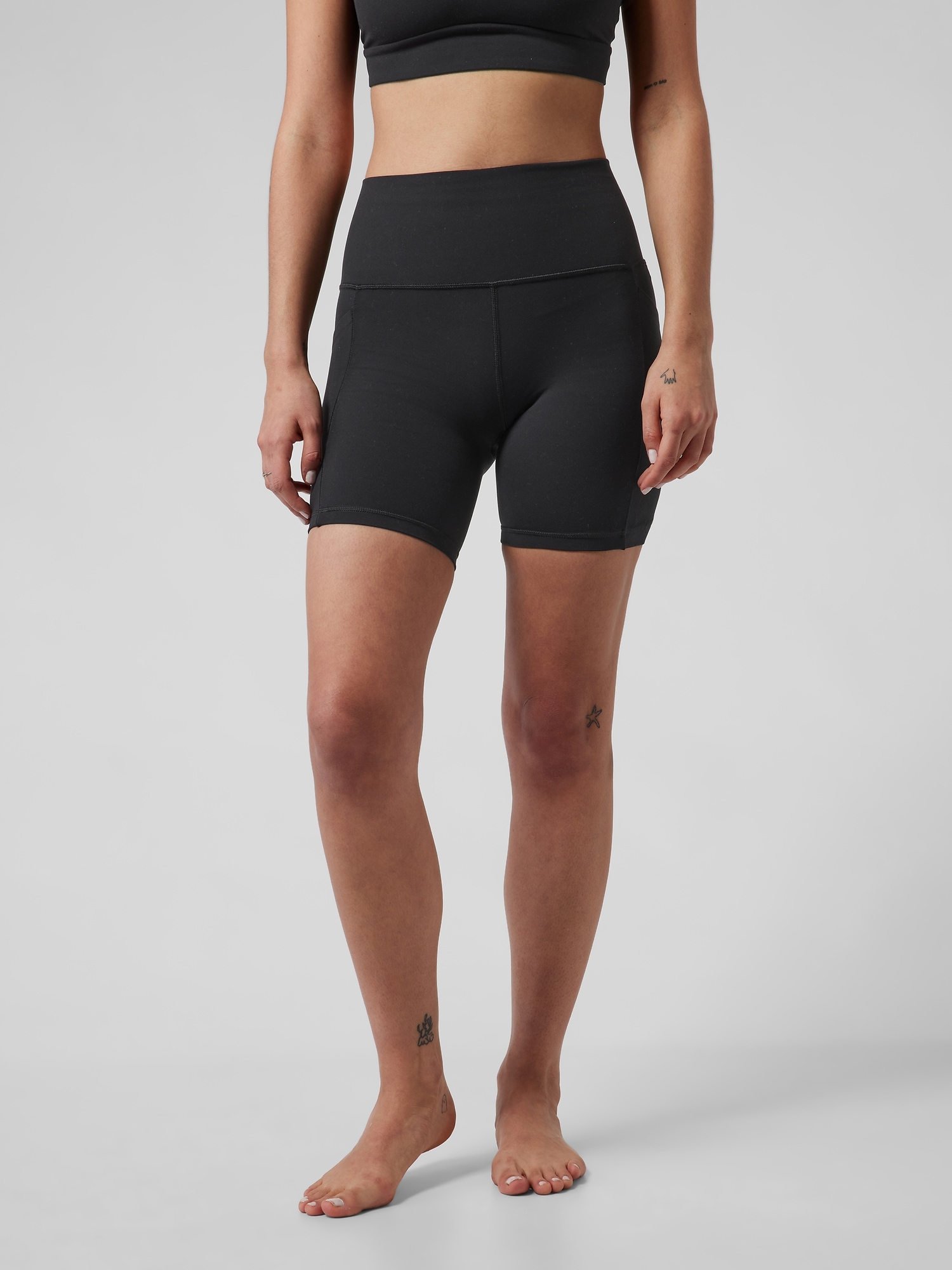 Athleta Salutation Stash High Rise 7 Short black. 1