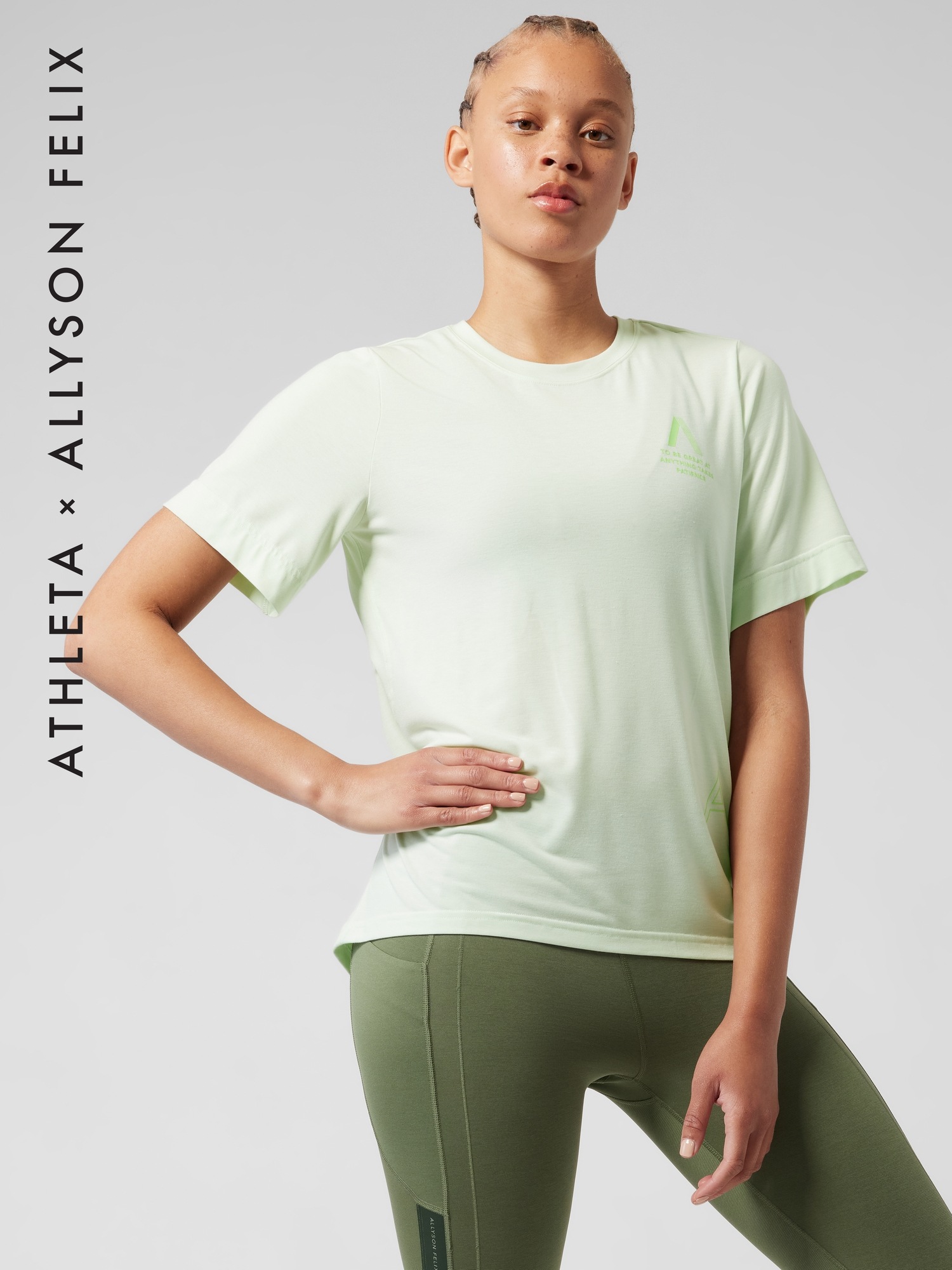 Athleta Legend Graphic Tee green. 1