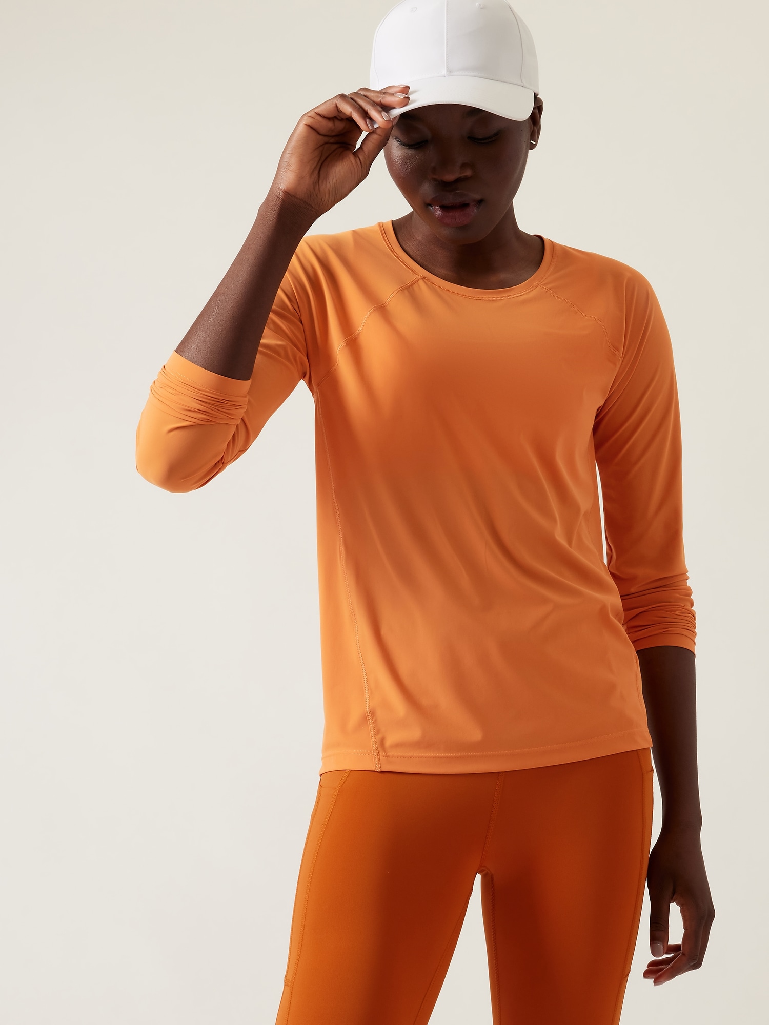 Athleta Ultimate Train Top orange. 1