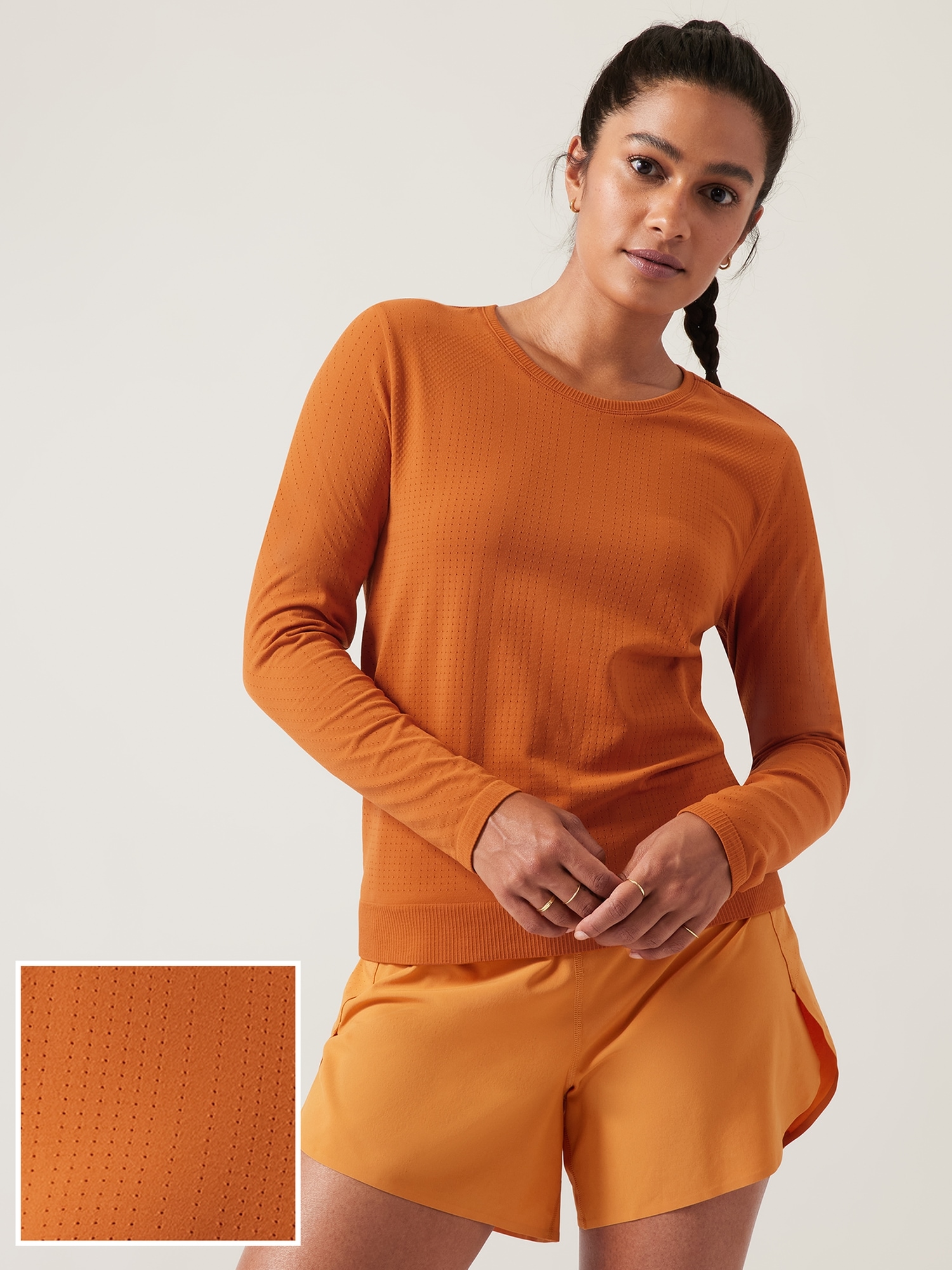 Athleta In Motion Seamless Top orange. 1