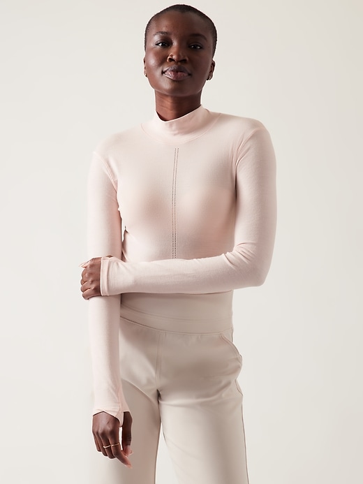 1 of 8 showing, with the color Orchid Pink of product Ascent Seamless Turtleneck