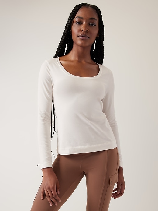 1 of 8 showing, with the color Magnolia White of product Outbound Scoop Neck Top