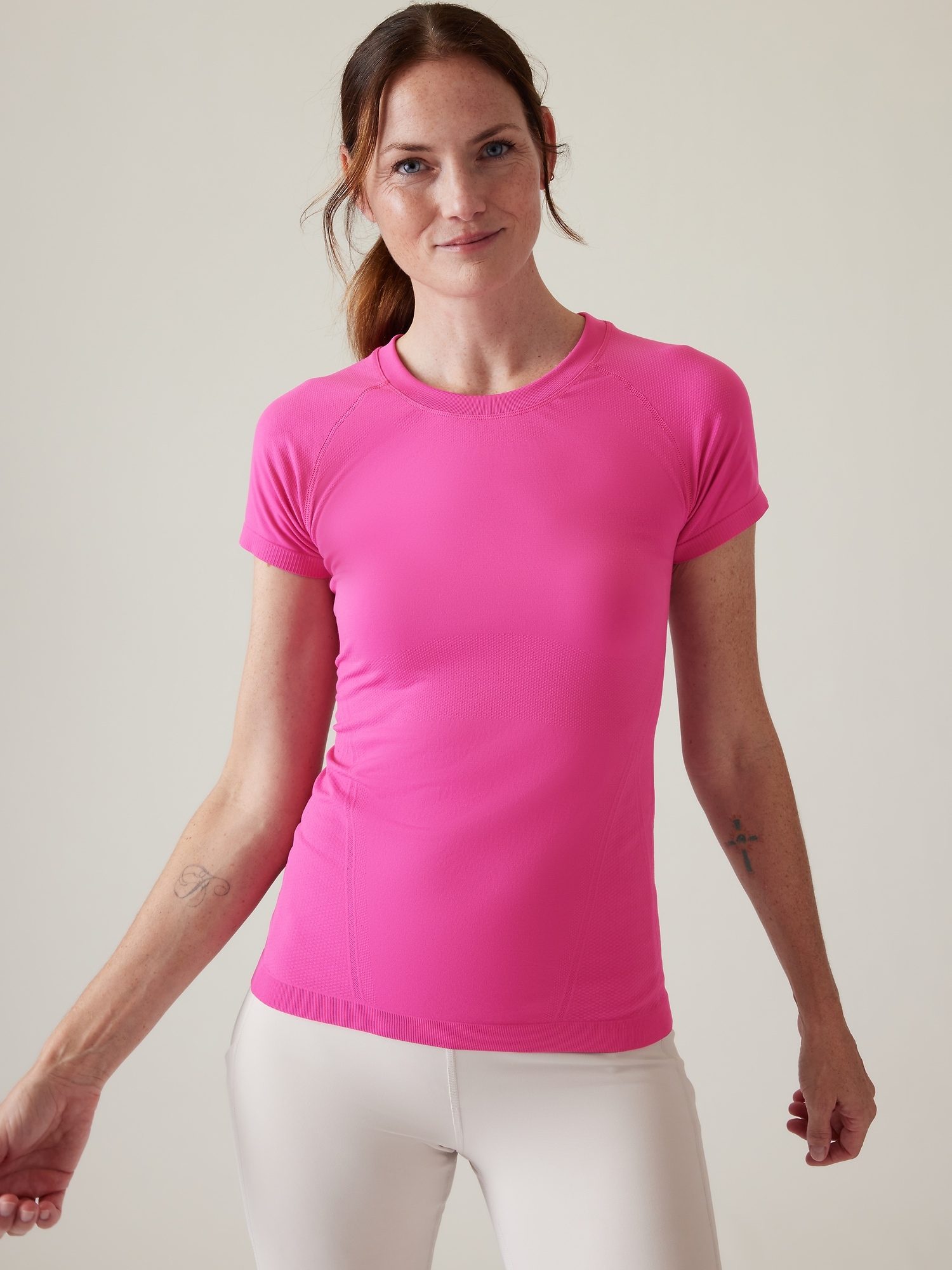 Athleta Momentum Seamless Tee pink. 1