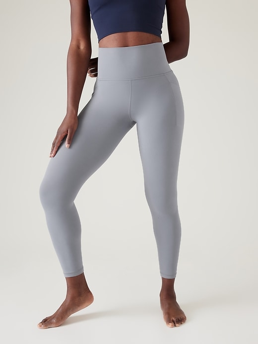 Athleta Salutation Stash 7/8 Tight. 1