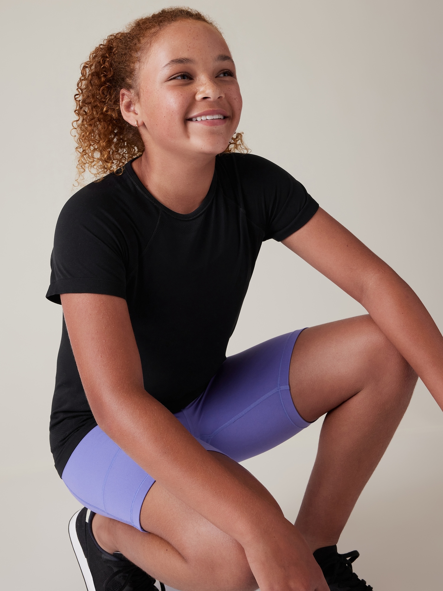 Athleta Girl Power Up Seamless Regular Length Tee black. 1