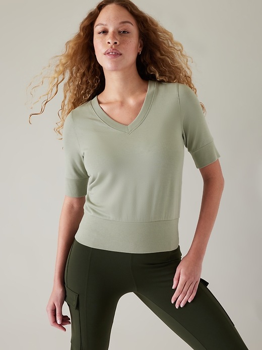 1 of 8 showing, with the color Fern Green of product Step Forward Sweatshirt Tee