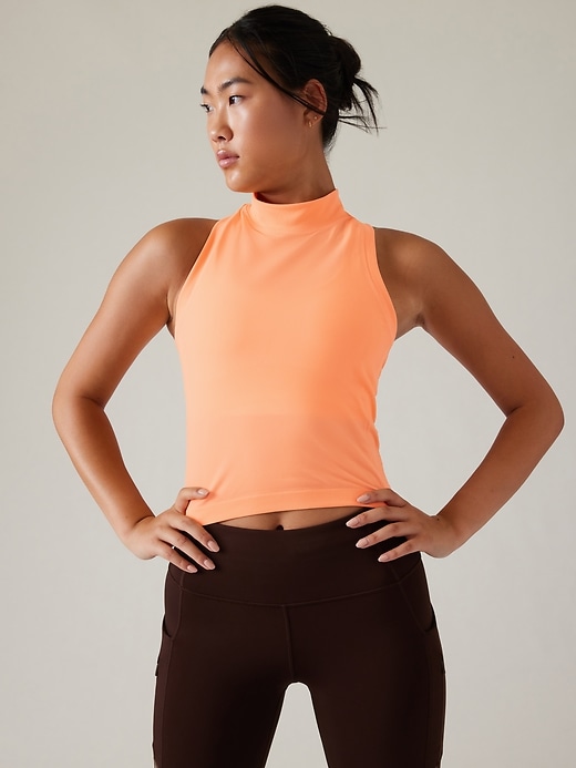 1 of 8 showing, with the color Foxglove Peach of product Momentum Seamless Sport Length Mock Tank