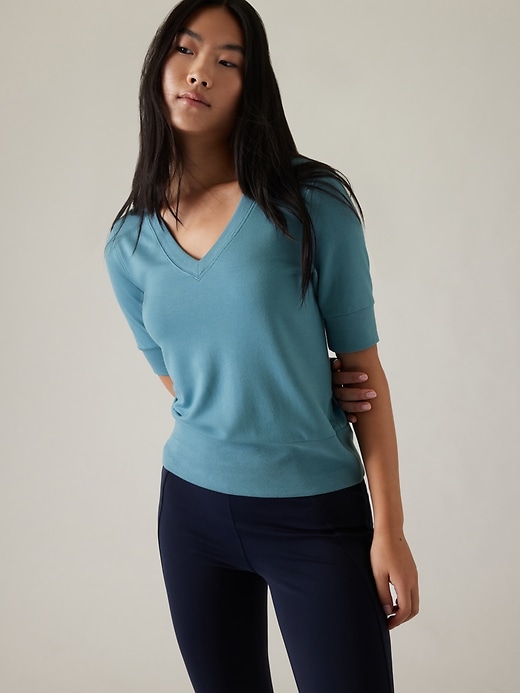 1 of 8 showing, with the color Skylark Blue of product Step Forward Sweatshirt Tee