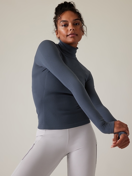 1 of 8 showing, with the color Granite Blue of product Flurry Seamless Turtleneck Top