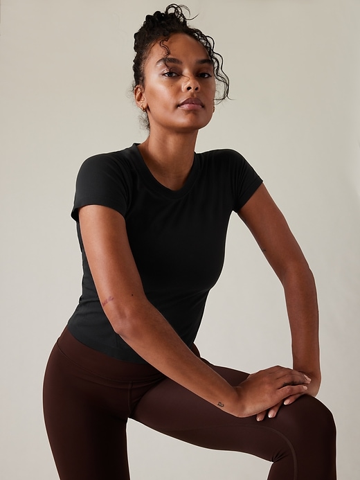 1 of 8 showing, with the color Black of product Momentum Seamless Sport Length Tee