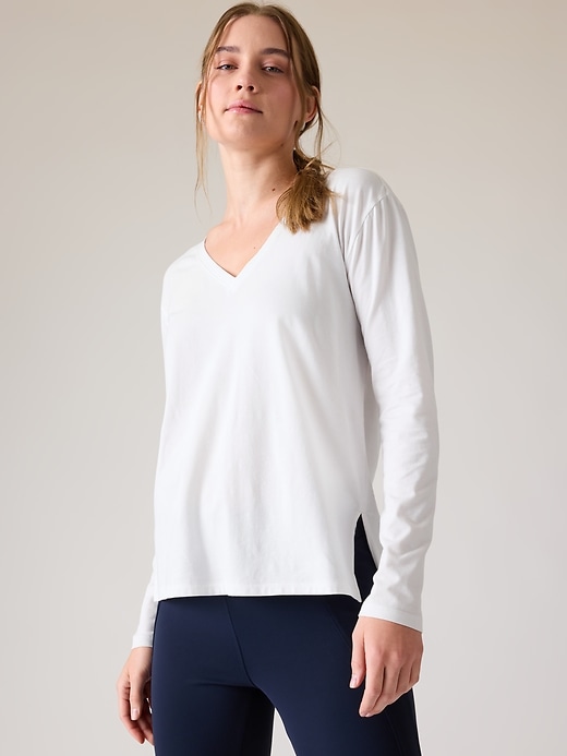 1 of 8 showing, with the color Bright White of product Outbound V-Neck Top