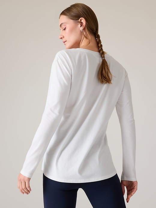 2 of 8 showing, with the color Bright White of product Outbound V-Neck Top