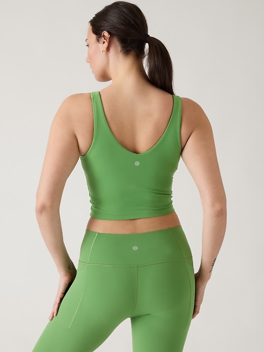 Neon hues and print pants are huge workout-wear trends: Athleta wicking  Prasada tank (with built-in bra), and wicking Rubik capris, $79, both at  Athleta stores (Manhasset, Manhattan); and Gaiam Shakti yoga mat