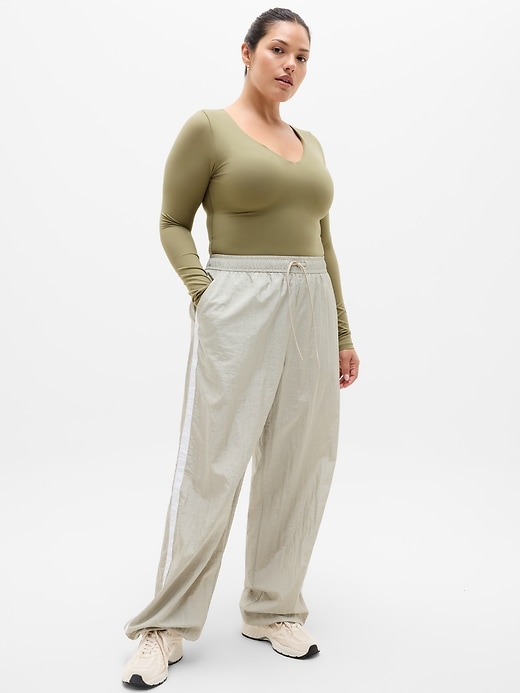Image number 7 showing, BodyMove Plunge Long Sleeve Bodysuit