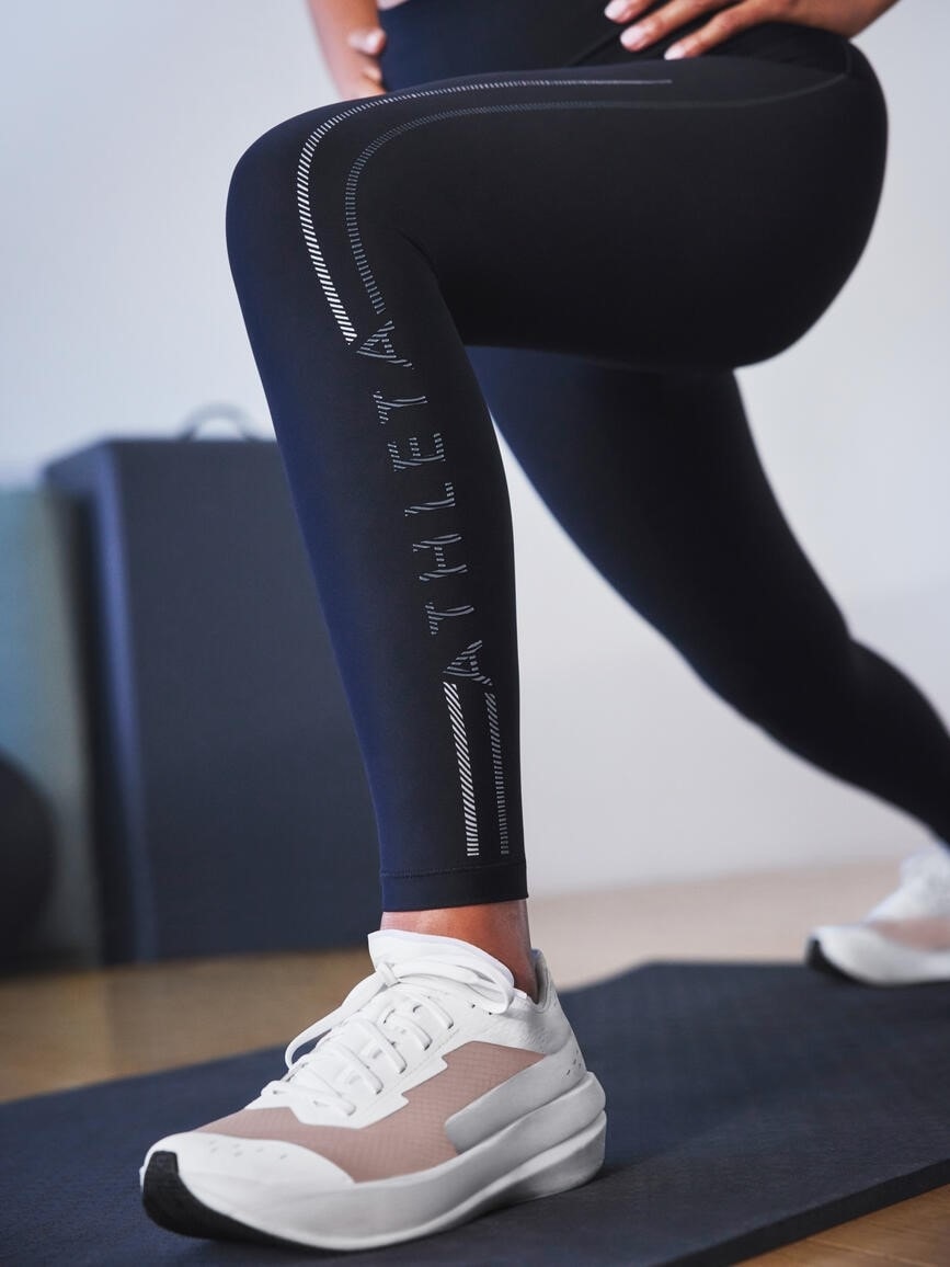 Athleta Interval High Rise Wordmark Legging In Black