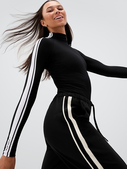 Image number 1 showing, Renew Seamless Mock Neck Stripe Logo Top